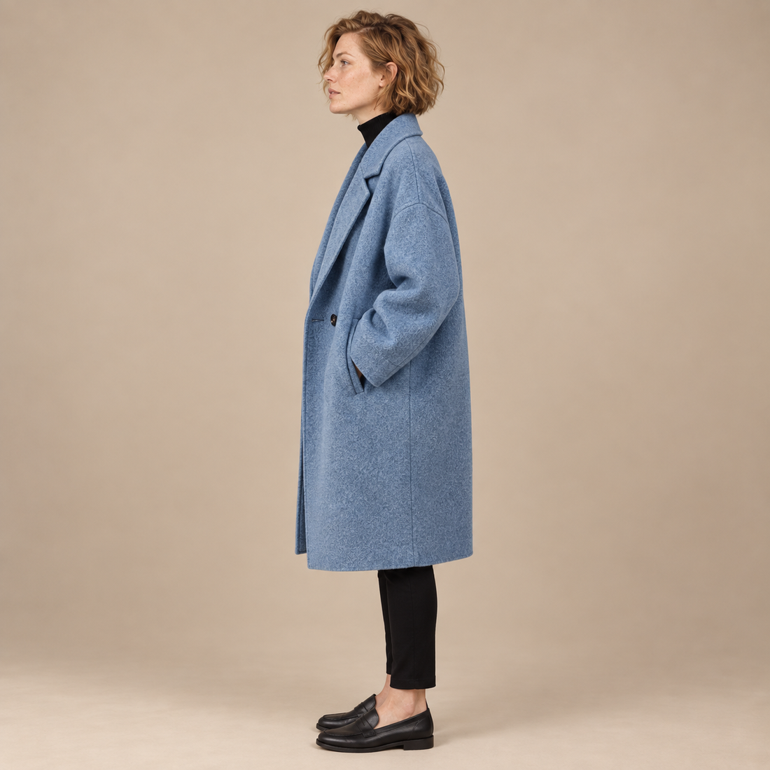 Oversized lange damesjas met klassieke revers