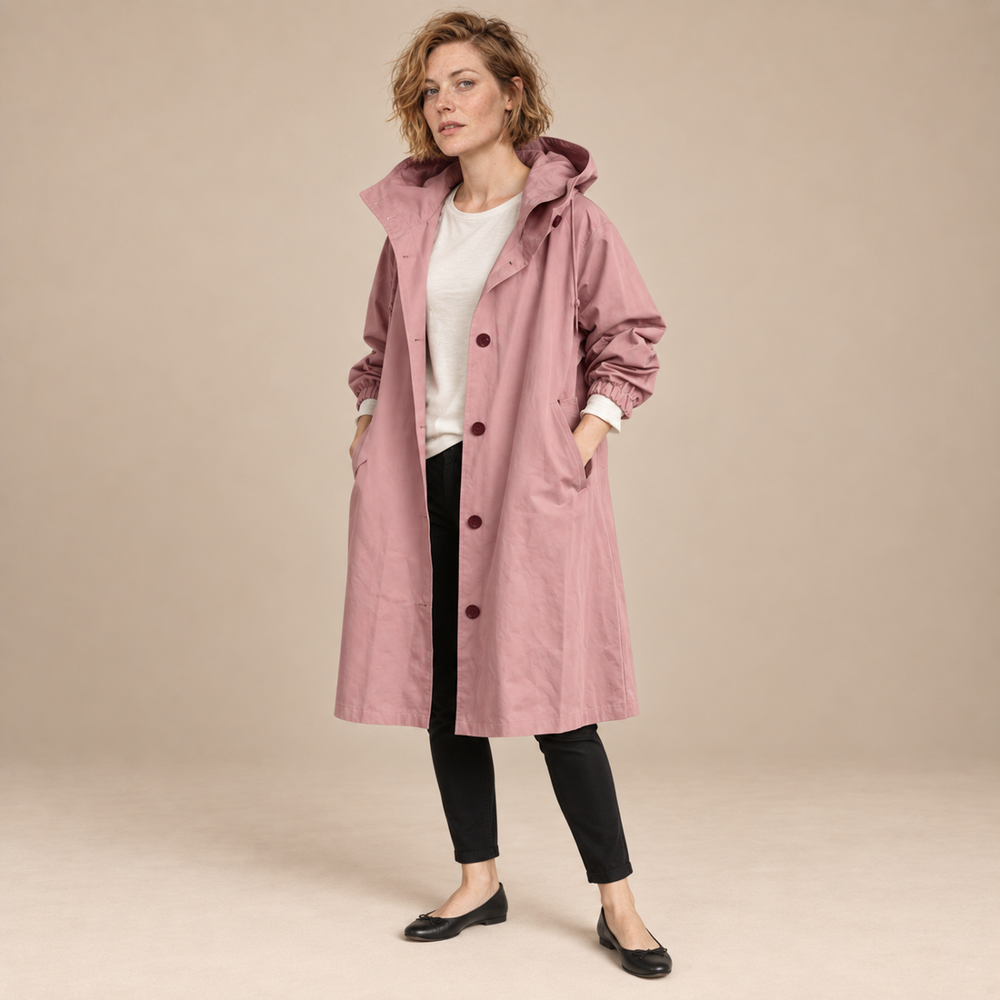 Lange damestrenchcoat met capuchon en knoopsluiting