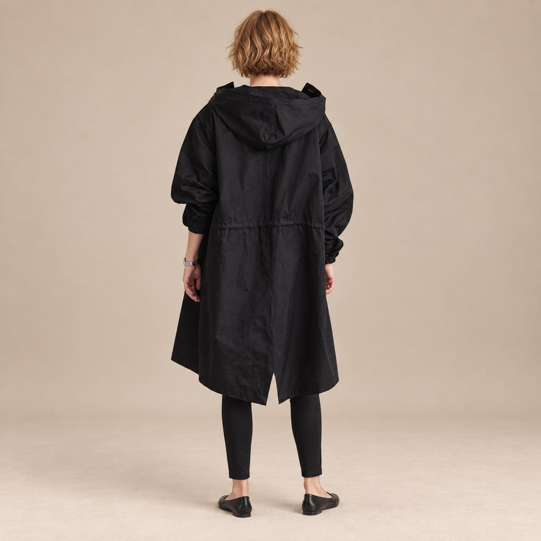 Lange damestrenchcoat met capuchon en knoopsluiting