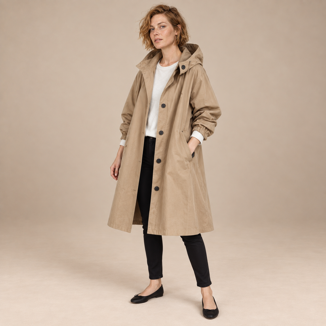 Lange damestrenchcoat met capuchon en knoopsluiting