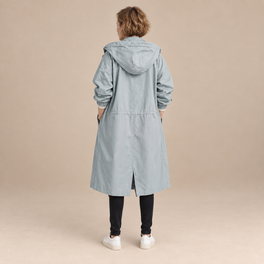 Lange damestrenchcoat met capuchon en knoopsluiting