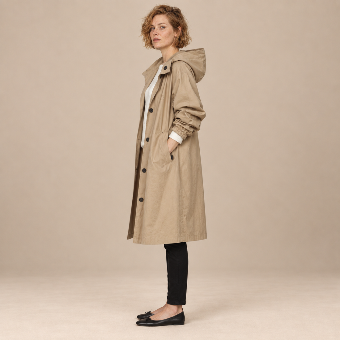 Lange damestrenchcoat met capuchon en knoopsluiting