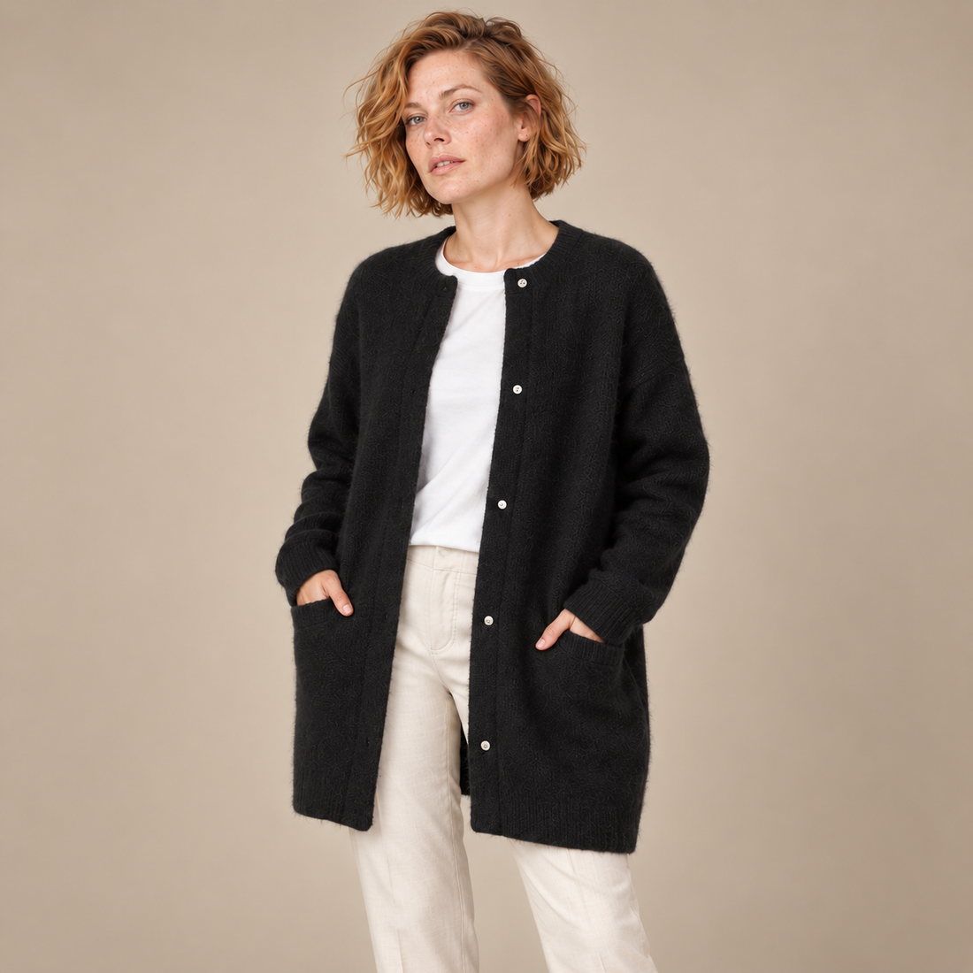 Damesvest met knoopsluiting, geribde boorden en zakken