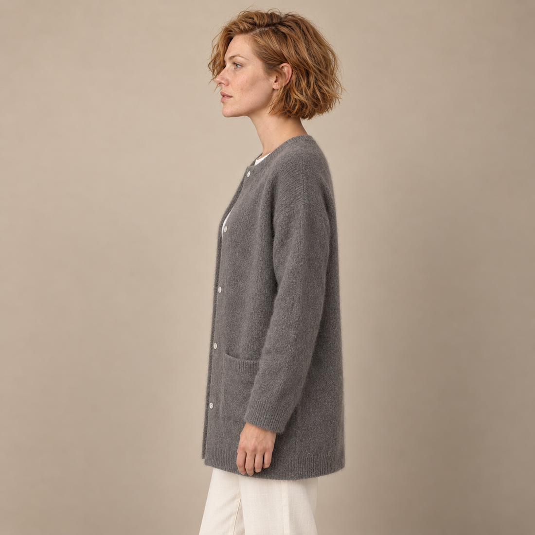 Damesvest met knoopsluiting, geribde boorden en zakken
