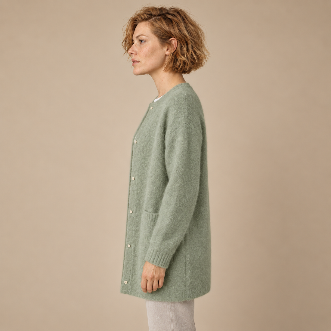 Damesvest met knoopsluiting, geribde boorden en zakken