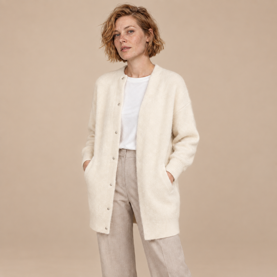 Damesvest met knoopsluiting, geribde boorden en zakken