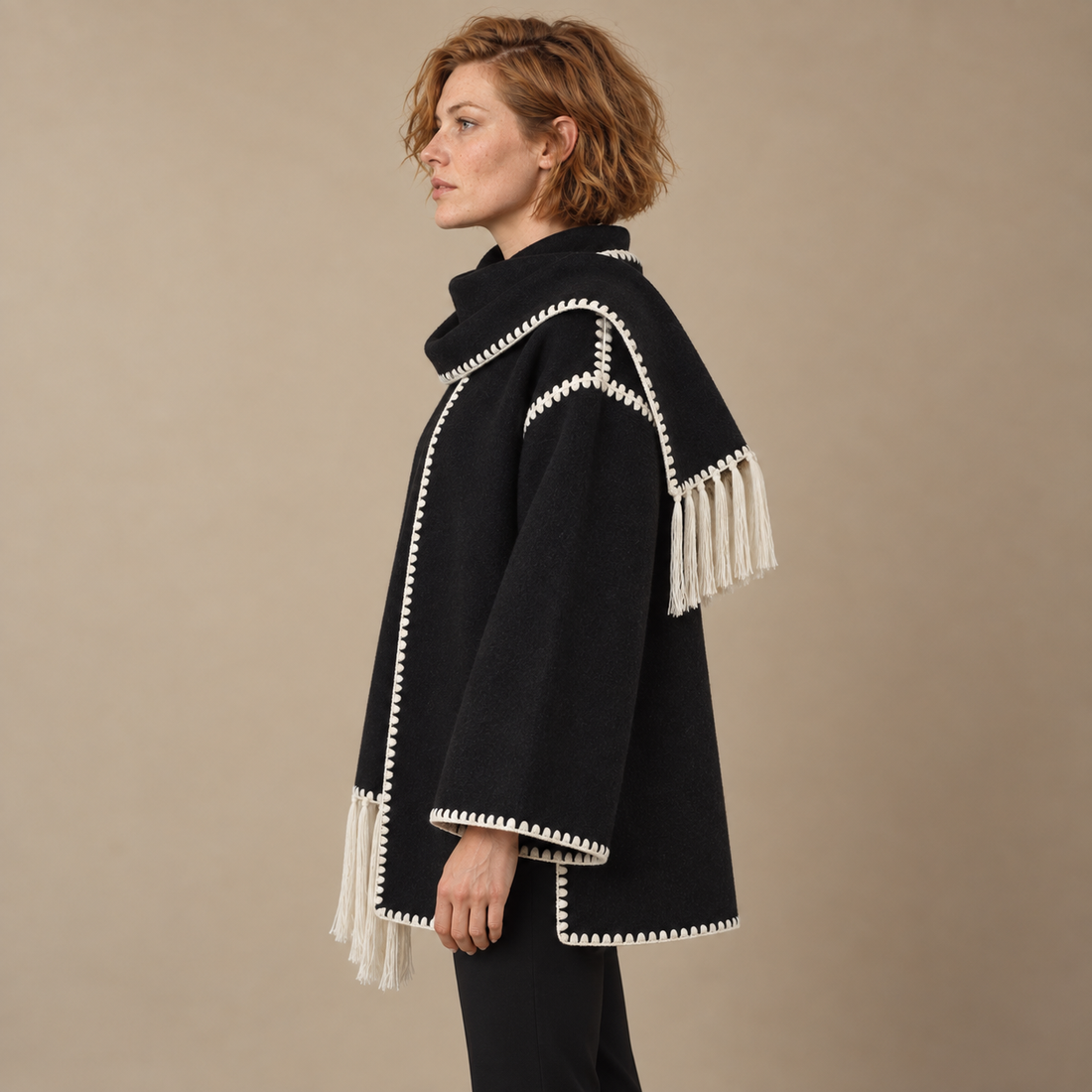Capejas voor dames met contrastrand en franjes
