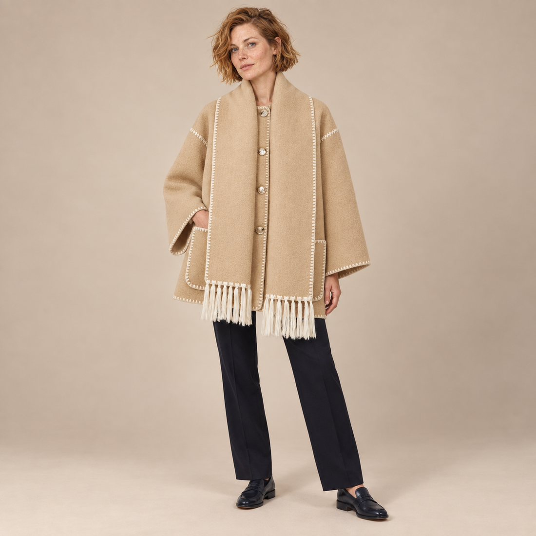 Capejas voor dames met contrastrand en franjes