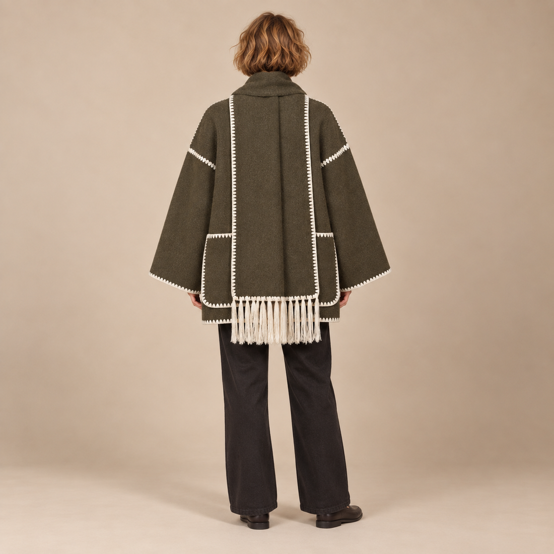 Capejas voor dames met contrastrand en franjes