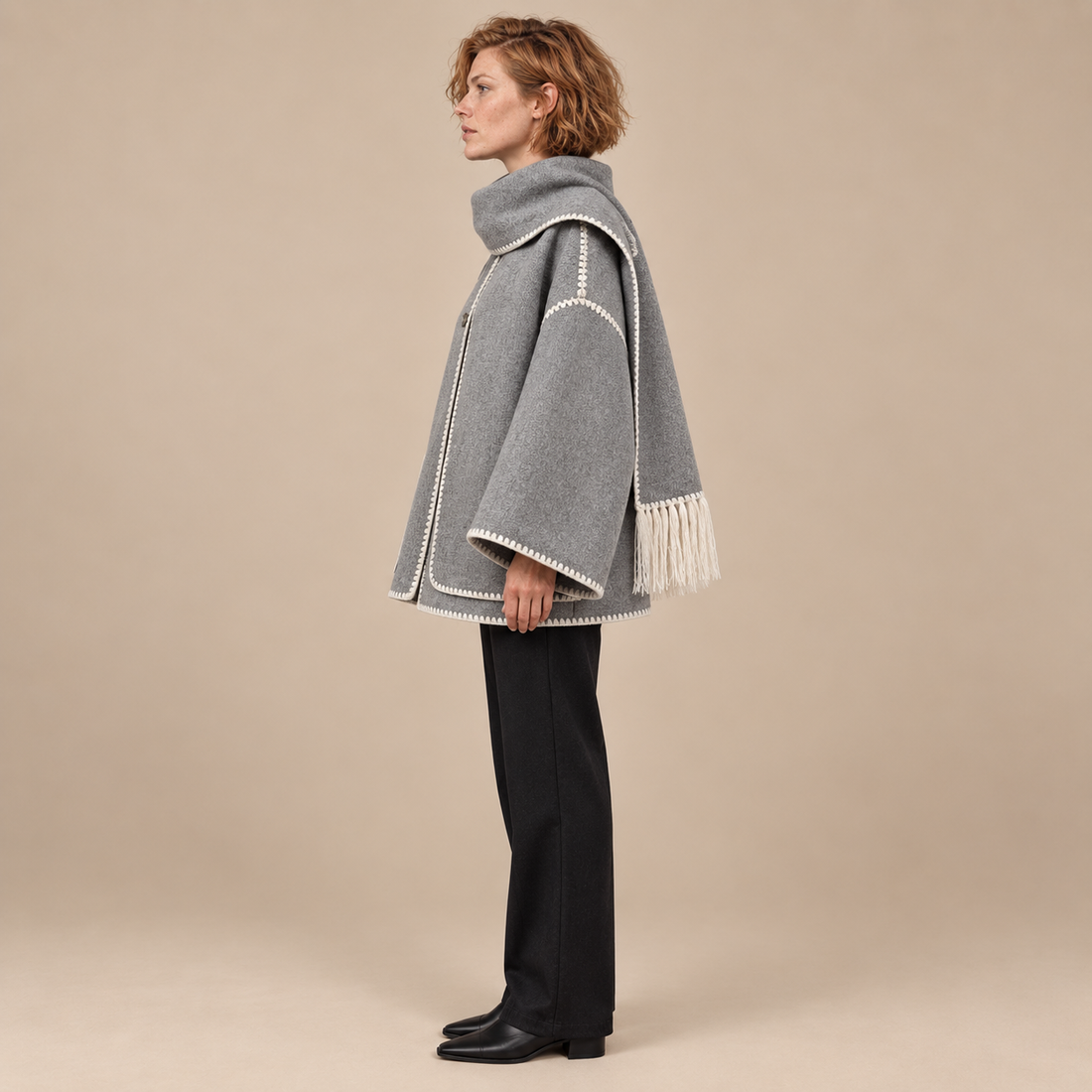 Capejas voor dames met contrastrand en franjes