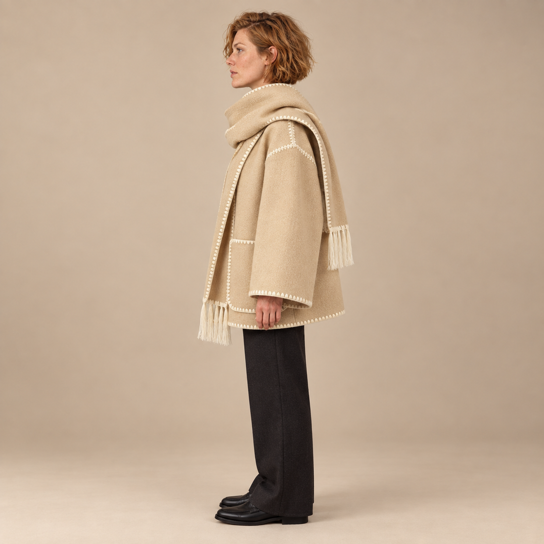 Capejas voor dames met contrastrand en franjes