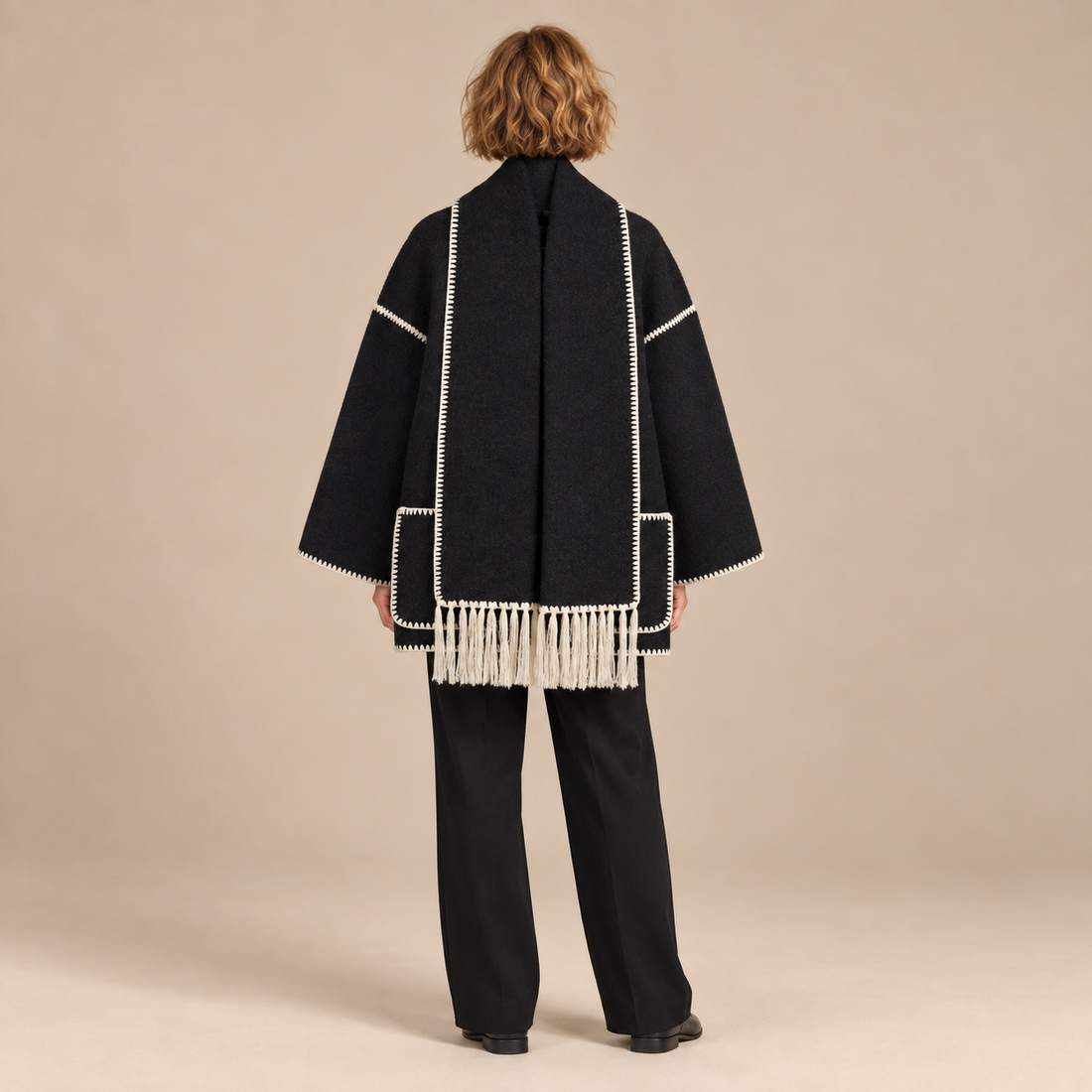 Capejas voor dames met contrastrand en franjes