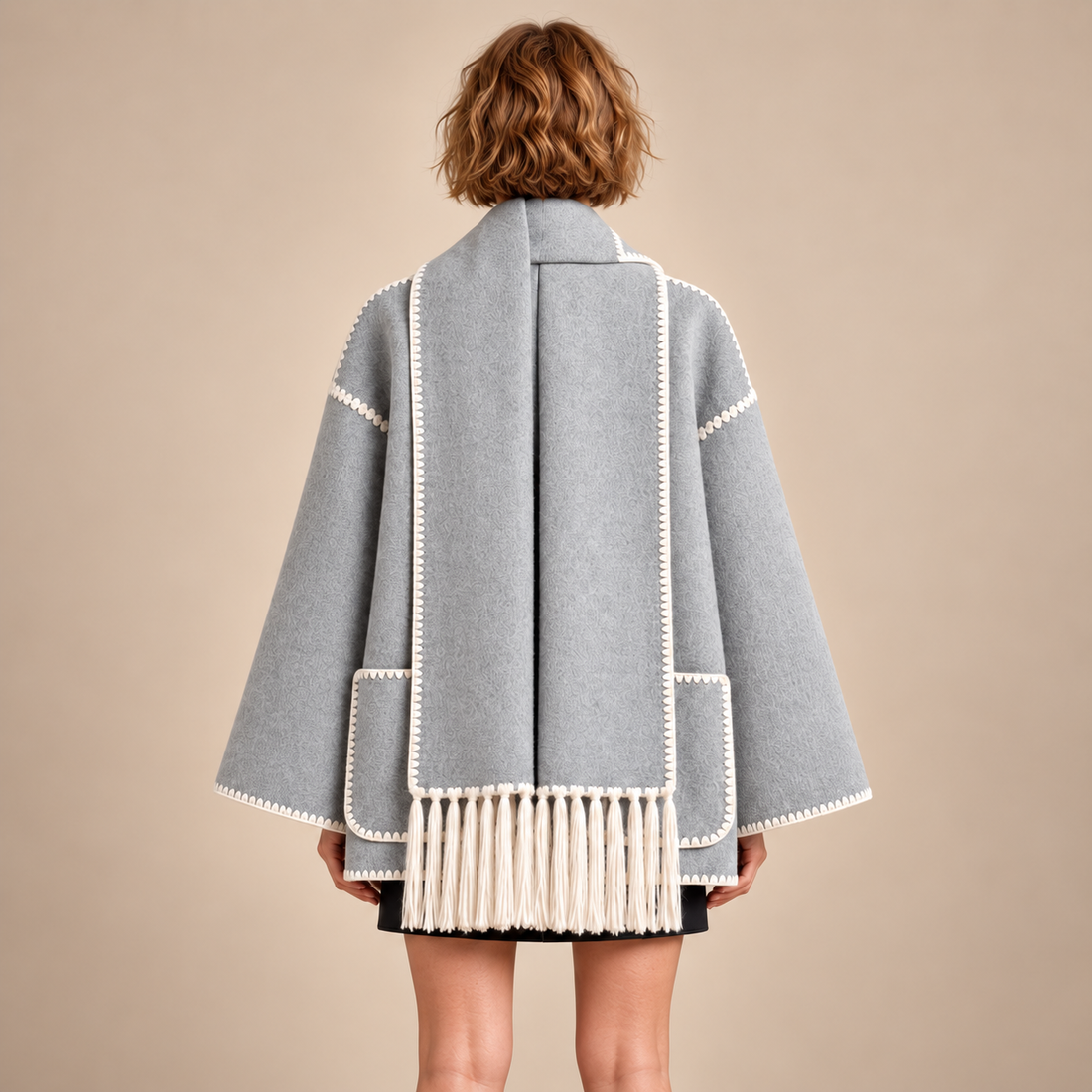 Oversized capejas voor dames met franjes en contrasterende stiksels